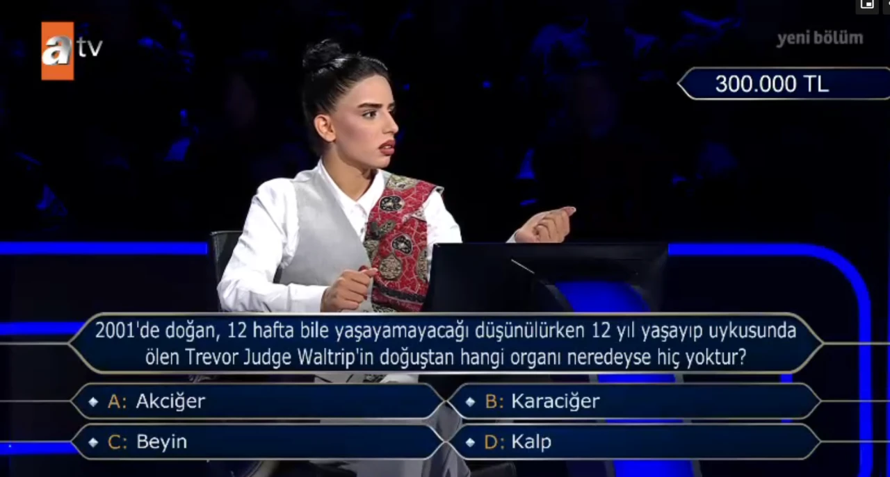 2001'de doğan, 12 hafta bile yaşayamayacağı düşünülürken 12 yıl yaşayıp uykusunda ölen Trevor Judge Waltrip'in doğuştan hangi organı neredeyse hiç yoktur?