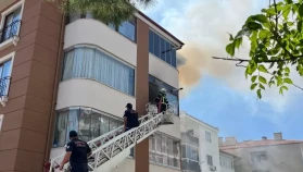 Menteşe’de 3 Katlı Binada Yangın: Mahsur Kalan Kadın Kurtarıldı