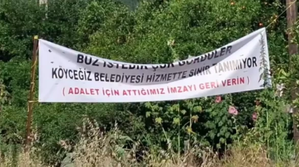 Köyceğiz’de Dikkat Çeken Pankart: “Adalet İçin Attığımız İmzayı Geri Verin”
