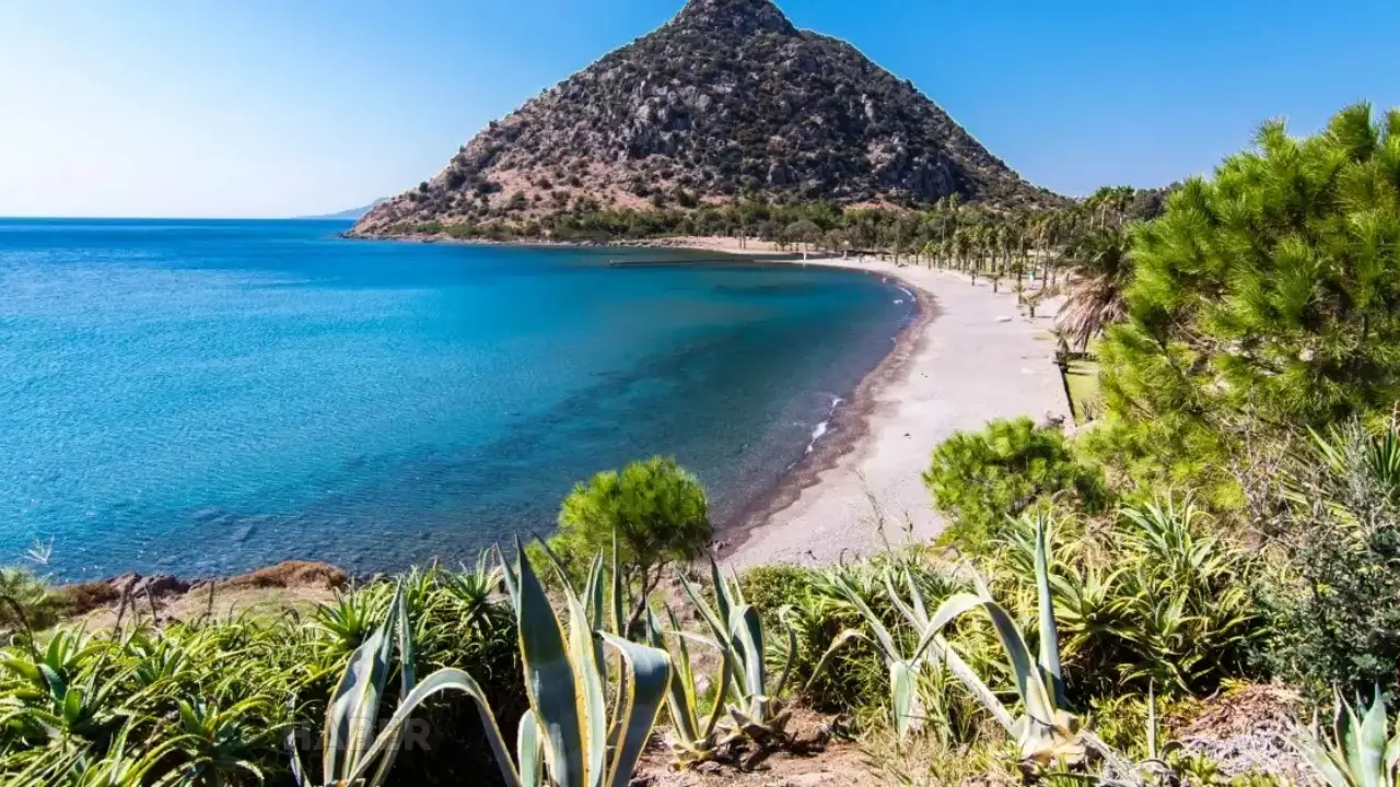 Bodrum Aspat Koyu nerede, nasıl gidilir? Antik Aspartos'tan günümüze uzanan tarihi, Çökertme Türküsü’ndeki yeri ve 2026 ziyaretçi rehberi burada.